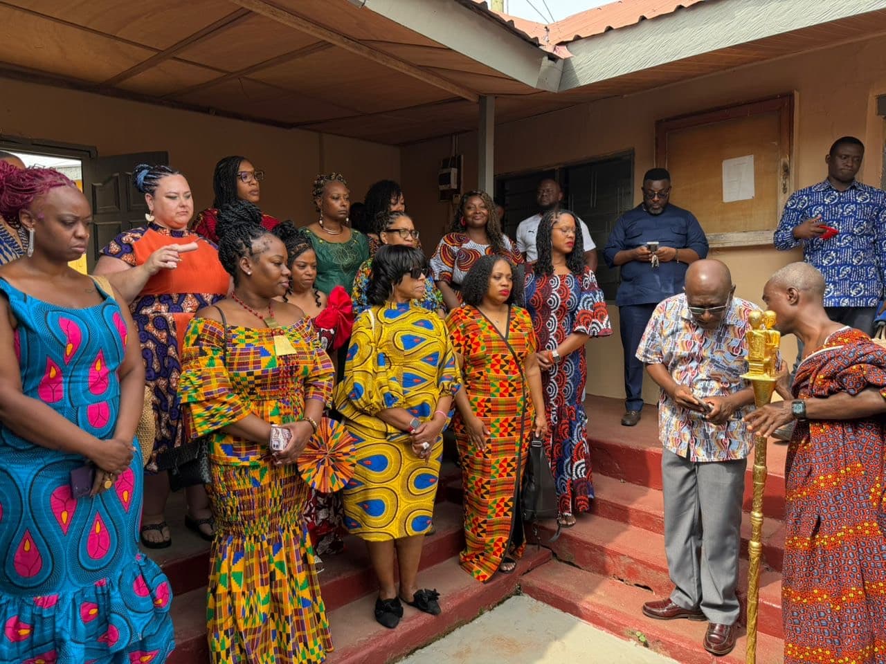 A visiting group being formally received by a chief and his elders